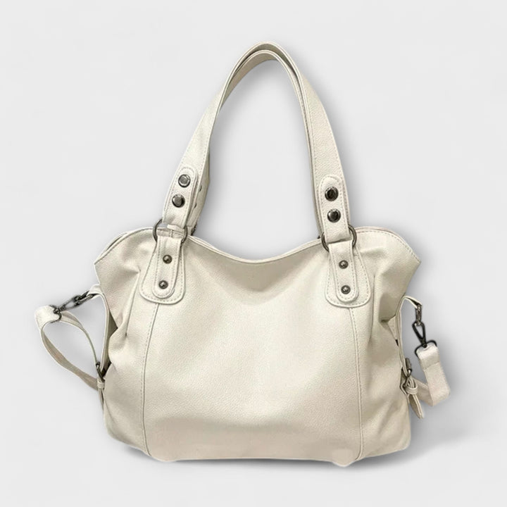 Elegant beige hobo shoulder bag for women, versatile fashion accessory for everyday style.