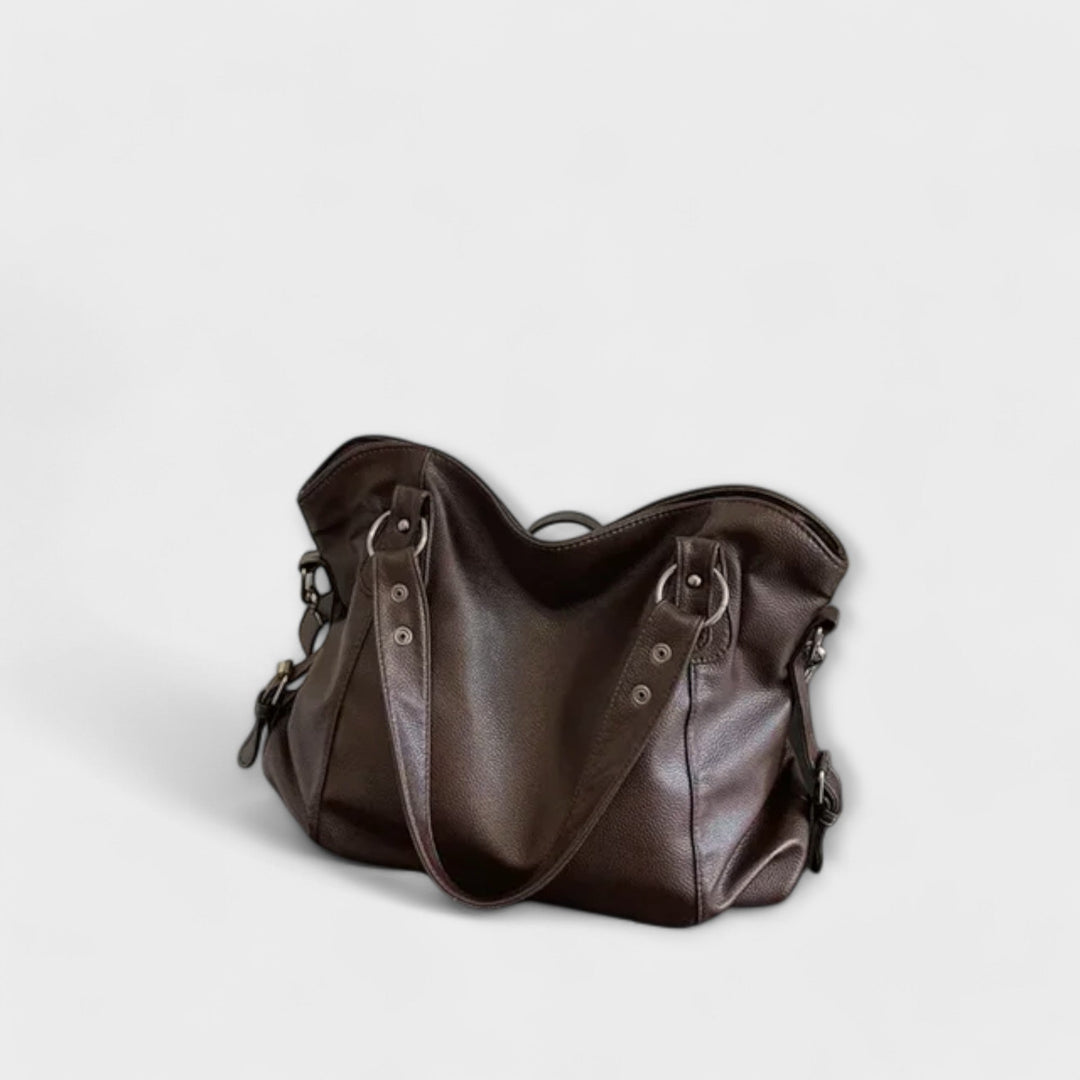 Modern black hobo shoulder bag for women, a fashionable and practical everyday accessory.