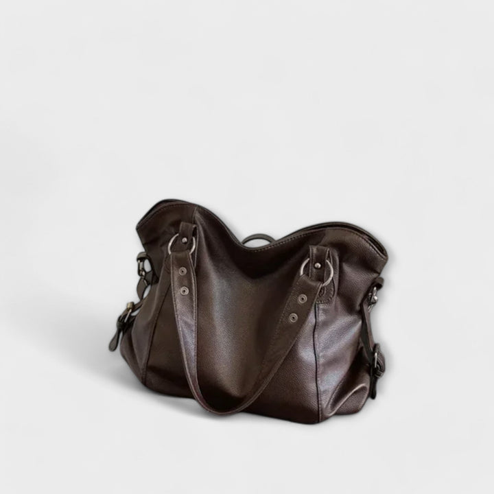Modern black hobo shoulder bag for women, a fashionable and practical everyday accessory.