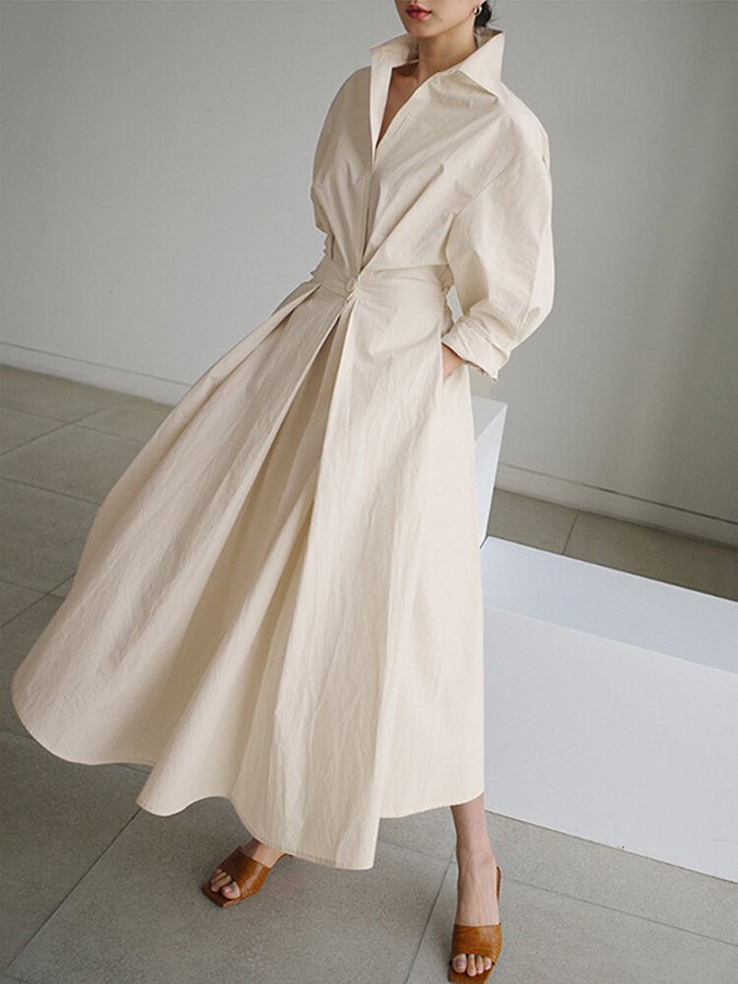 Elegant beige women's midi shirt dress with button-front, perfect for office or casual wear. Timeless and chic.
