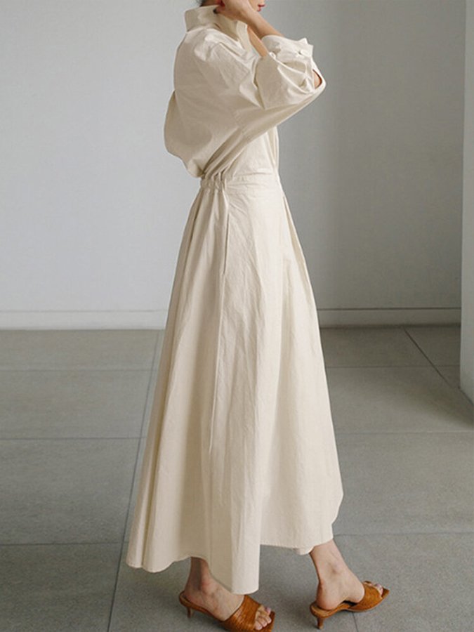 Army green women's midi shirt dress, elegant yet casual. Features a stylish button-front design and versatile fit.
