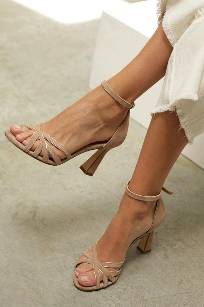 Elegant beige women's strappy block heel sandals with an ankle strap, perfect for parties and summer events.