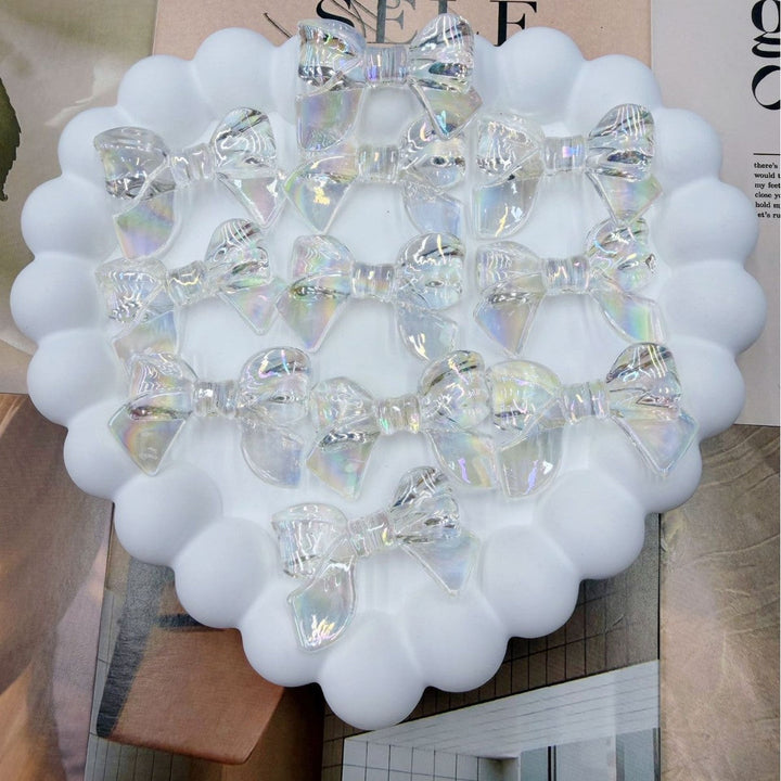 Colorful set of elegant acrylic bow hair clips for women, chic hair accessories.