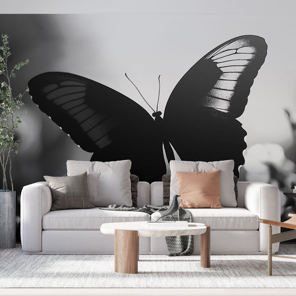 Elegant black butterfly wall mural, a modern peel and stick home decor for accent walls. Black & white insect design.