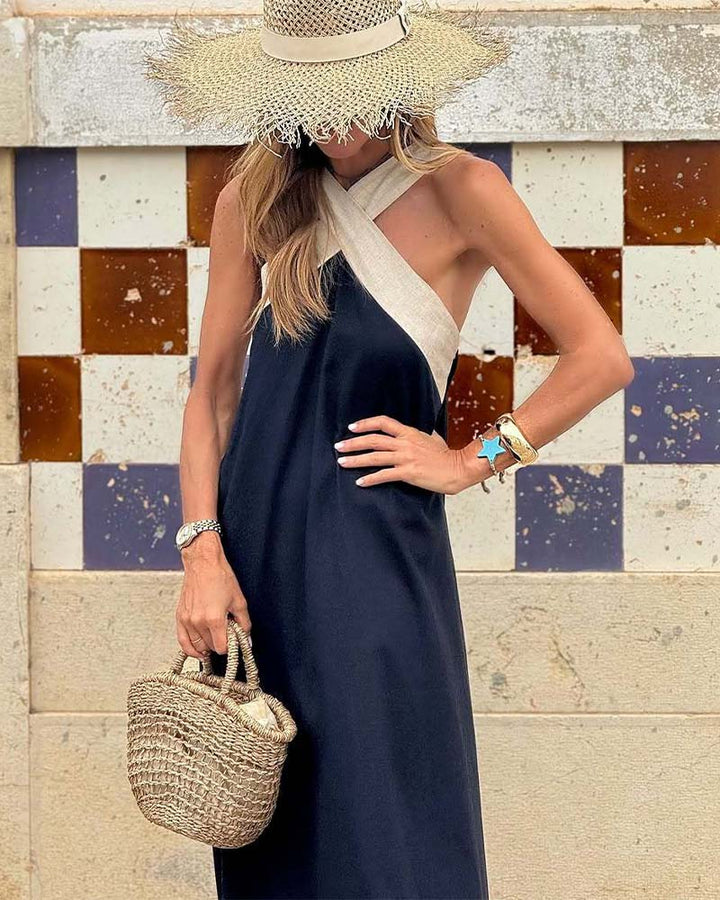 Sleeveless cross neck maxi dress for women, a chic and elegant option for evening parties & events.