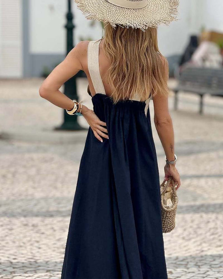 White sophisticated cross neck maxi dress for women, ideal for elegant evening events and formal gatherings.