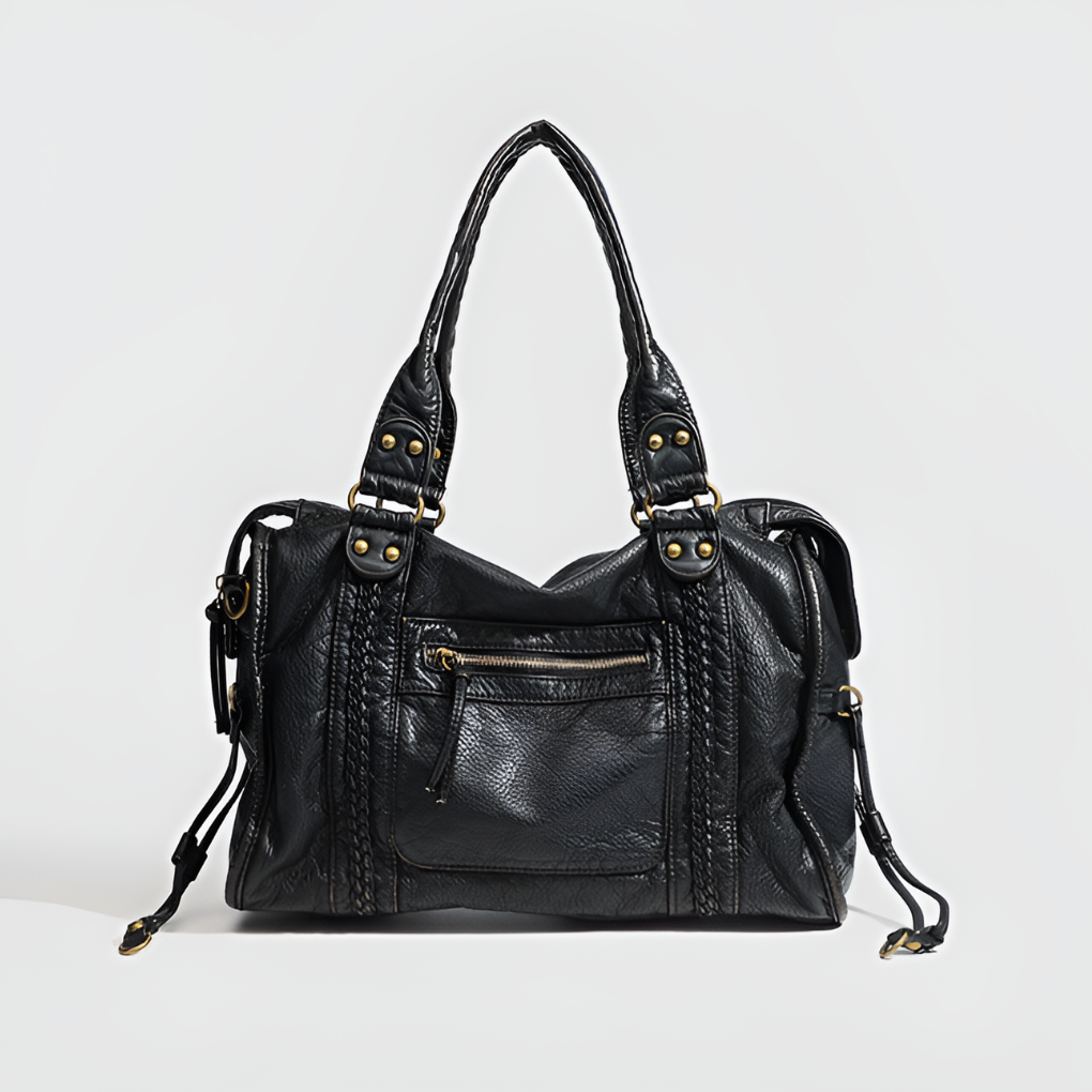 Elegant black faux leather shoulder bag for women. A stylish & versatile everyday handbag with organized compartments.