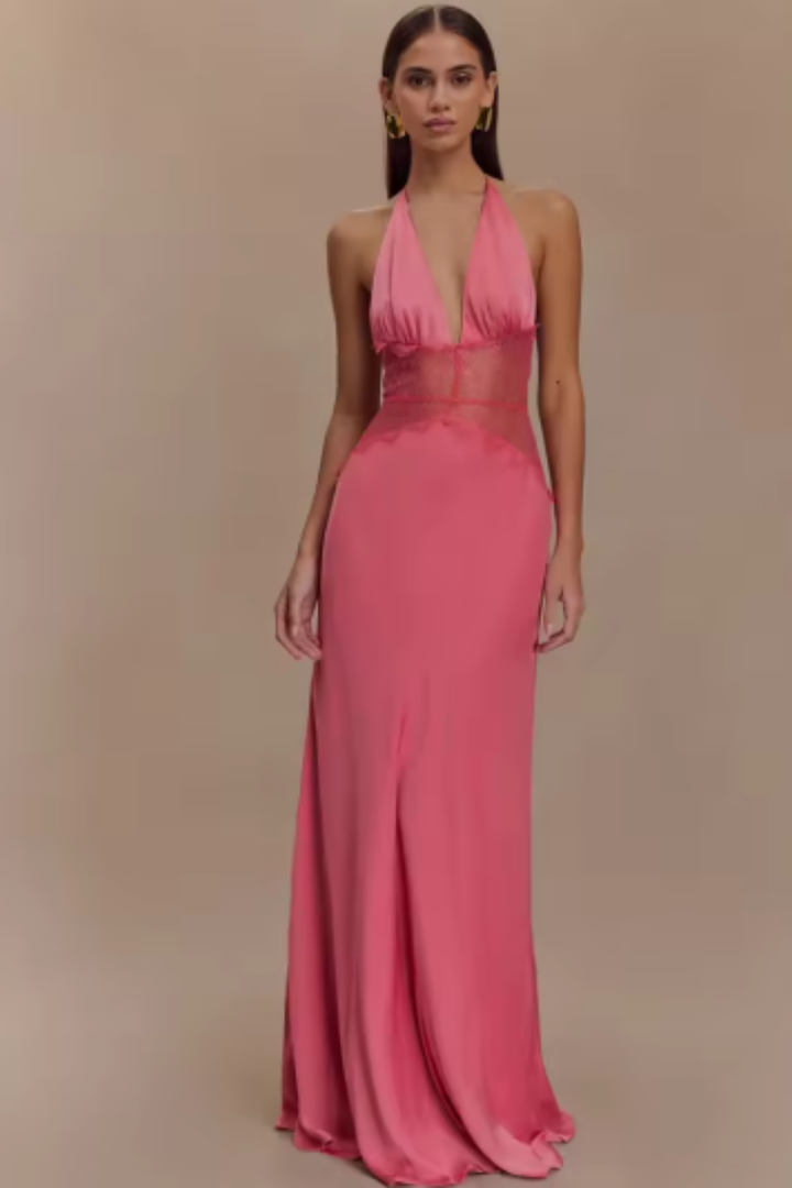 Modern flattering halter neck backless maxi dress, a stylish formal gown for women's special events.