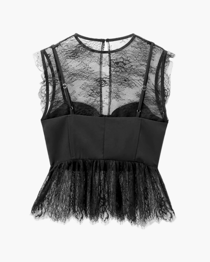 Feminine women's peplum top with lace and corset details. A stylish structured blouse for evening occasions.