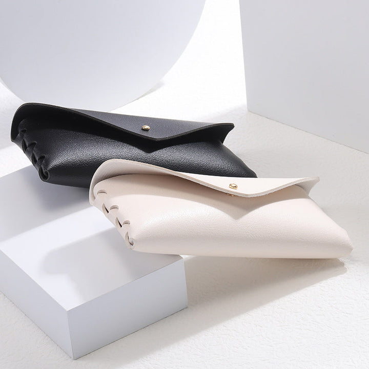 Unisex elegant leather phone case, sleek minimalist design, perfect for phone protection & card storage.