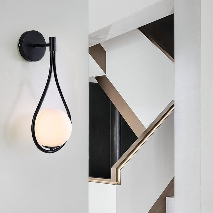 Contemporary gold LED wall sconce providing ambient lighting for stylish living rooms, bedrooms, or office spaces.