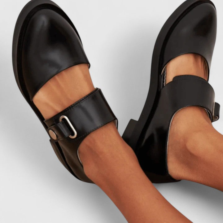 Comfortable black low-heel women's dress shoes with stylish buckle, ideal for office or elegant events.