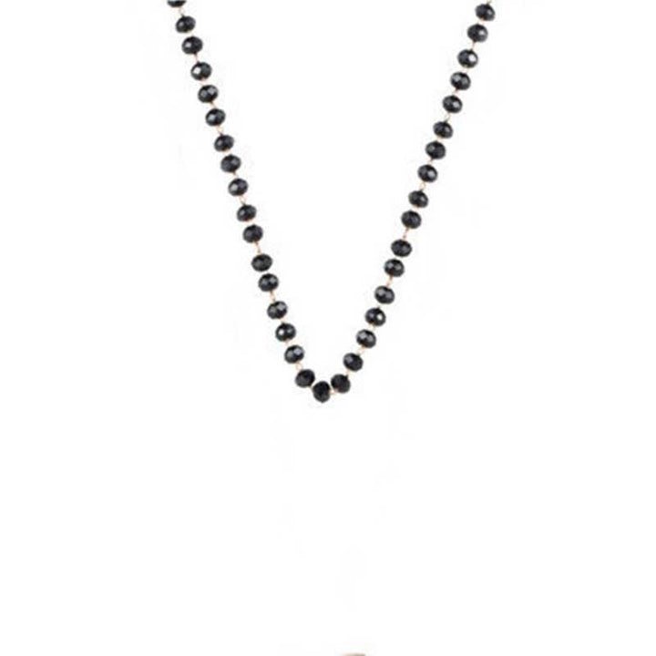 Simple yet elegant black beaded choker necklace, a versatile minimalist jewelry piece for women.