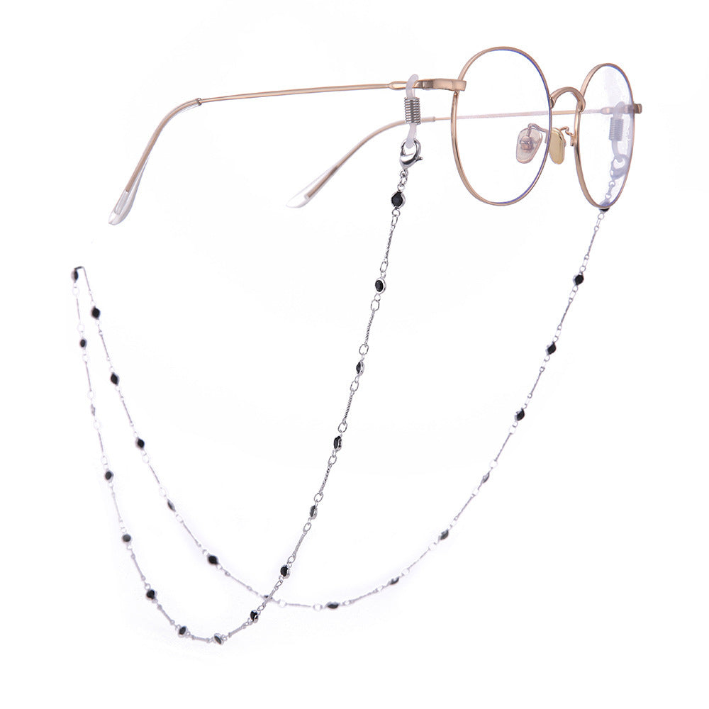 Versatile onyx bead chain in black or emerald green. Functions as a jewelry holder or glasses chain for women.