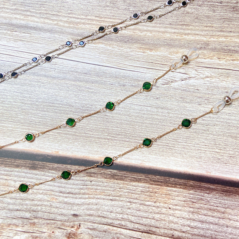 Women's elegant black onyx bead neck chain, perfect for holding jewelry or as a stylish glasses holder.