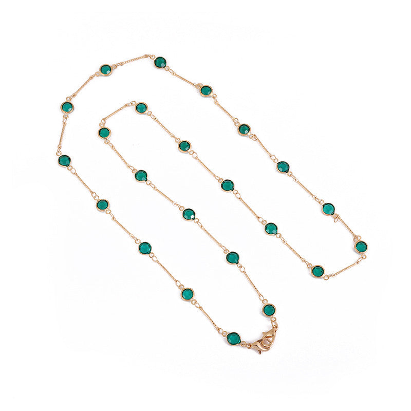 Chic women's fashion accessory: elegant onyx bead chain in black, doubles as a jewelry or glasses holder.