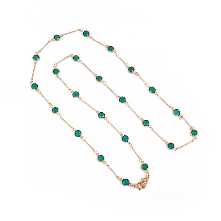 Chic women's fashion accessory: elegant onyx bead chain in black, doubles as a jewelry or glasses holder.