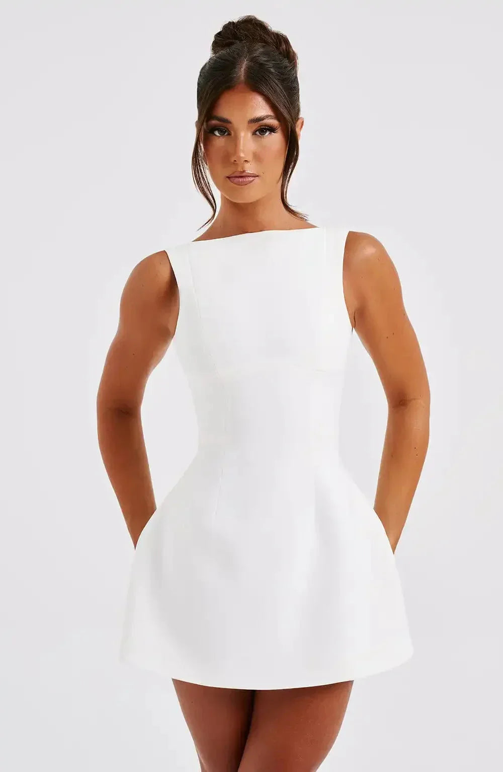 Women's sophisticated black & white boat neck A-line mini dress, ideal for evening wear & elegant parties.