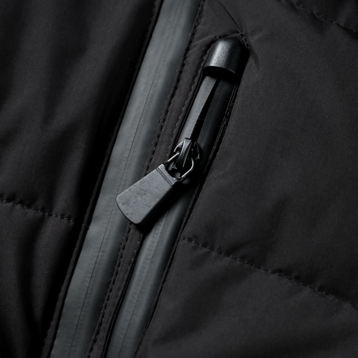 Black women's belted puffer jacket, a fashionable & warm winter coat with a cozy quilted design.