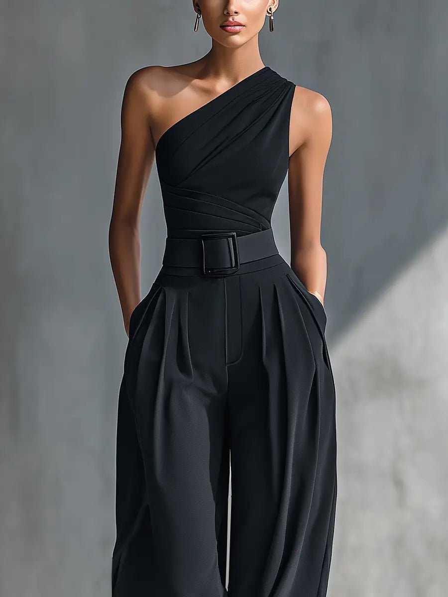 Sophisticated women's black one-shoulder top and wide-leg trousers. Perfect two-piece set for chic evening wear.