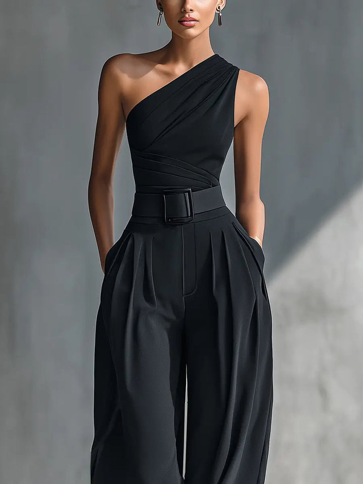 Sophisticated women's black one-shoulder top and wide-leg trousers. Perfect two-piece set for chic evening wear.