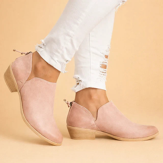 Comfortable and stylish women's dress ankle boots, a classic slip-on design for elegant everyday wear.