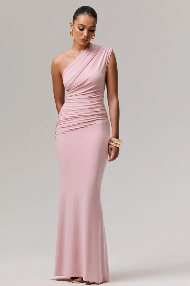 Sophisticated blue one shoulder maxi dress for women. Ruched, fitted, and elegant for formal graduations.