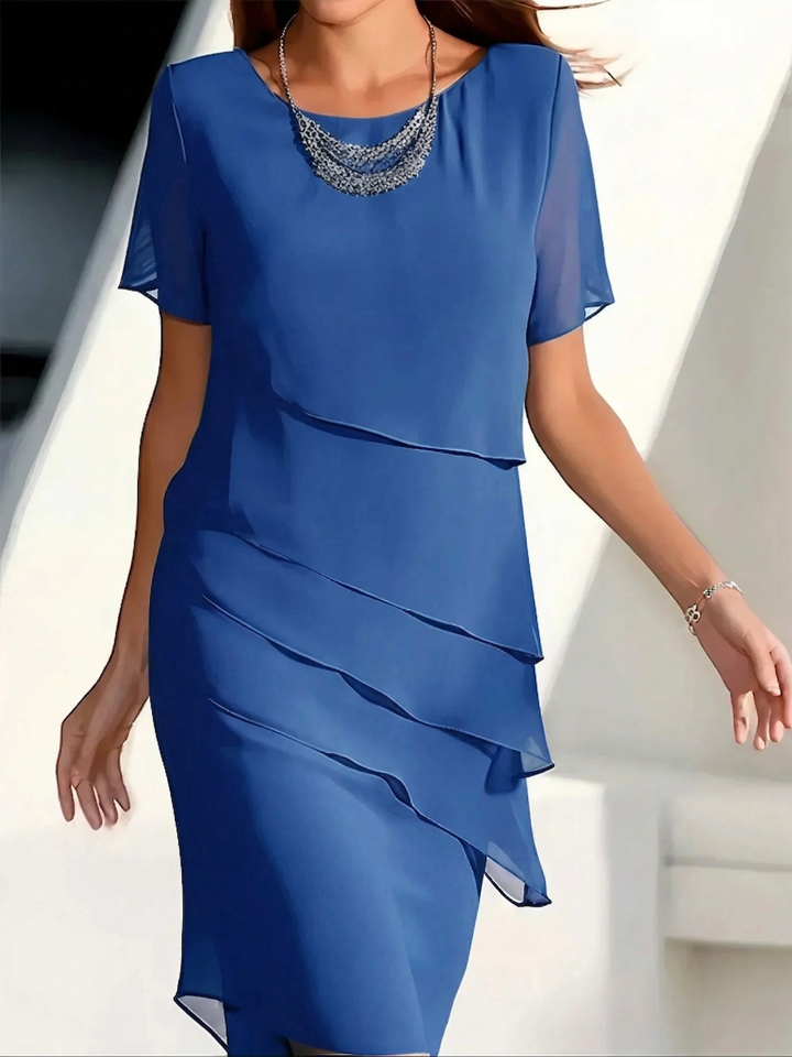 Elegant blue summer midi dress for women, comfortable & flattering, perfect for parties or casual wear.