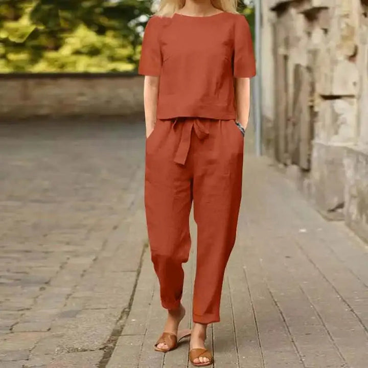 Stylish brown women's jumpsuit set, an elegant and comfortable one-piece for versatile fashion.