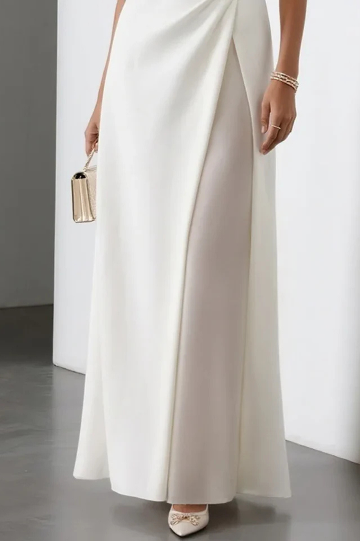 Sleeveless boat neck maxi dress for women, elegant with draped waist detail, perfect for evening or party wear.