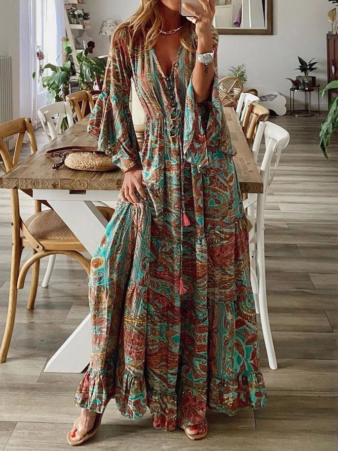 Flowy women's summer maxi dress with vibrant paisley pattern, very comfortable.