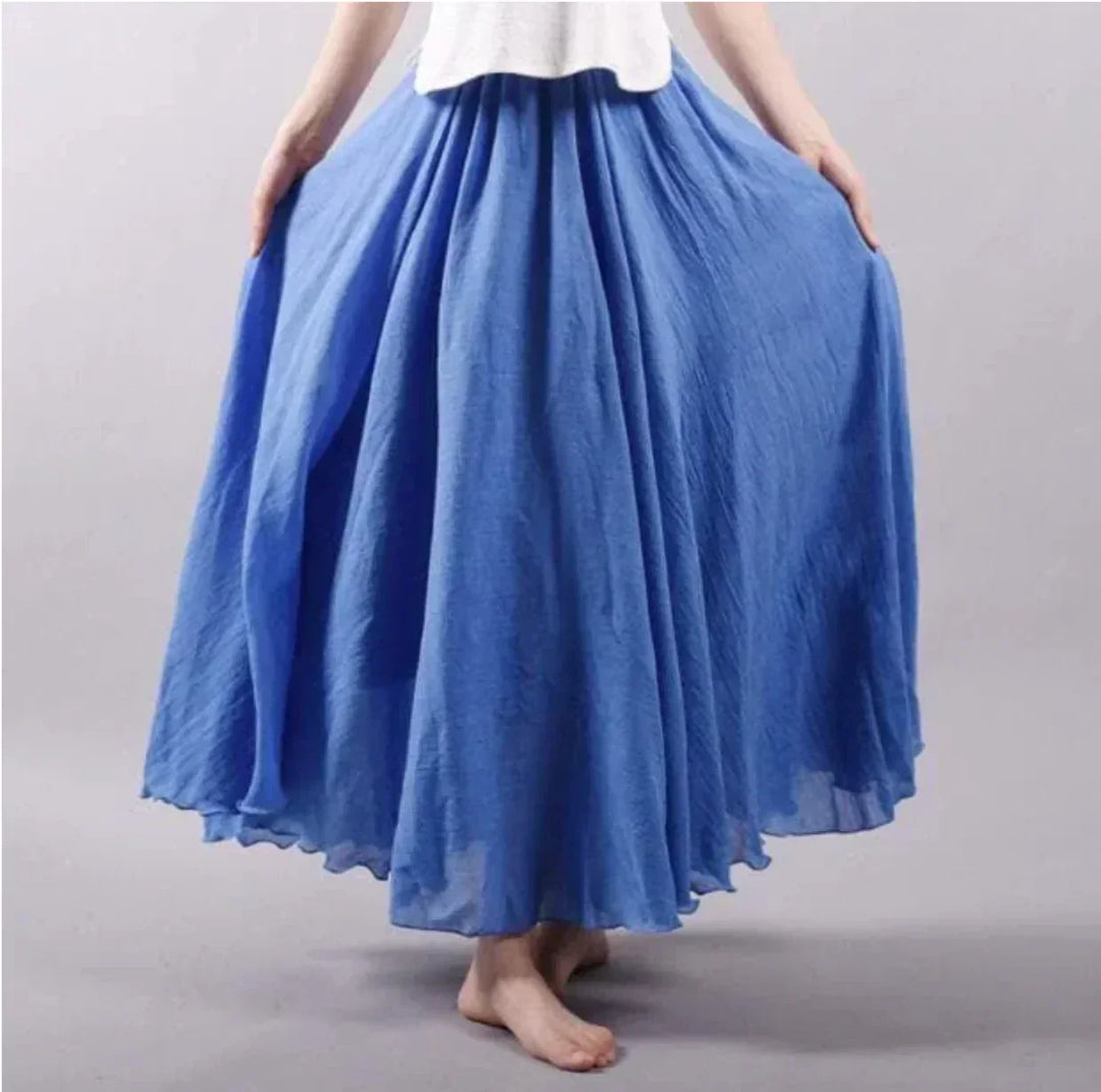 Flowy boho maxi skirt, elegant and versatile for women. Ideal casual or chic summer wear.