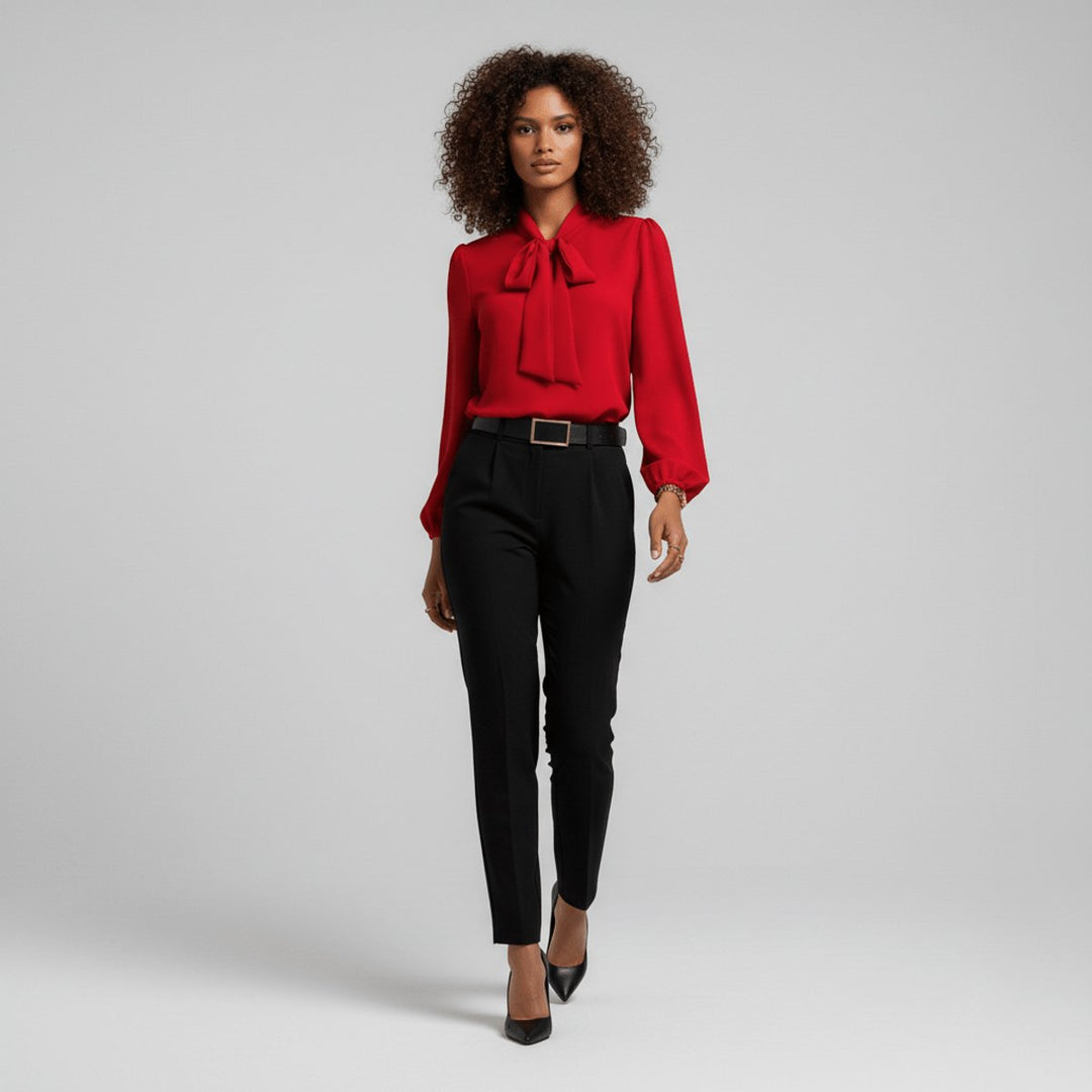 Women's sophisticated long-sleeve blouse with a stylish tie neck, ideal for professional workwear.
