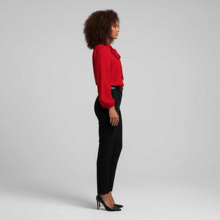 Chic bow-tie long-sleeve women's top, offering a relaxed fit for both office and casual wear.