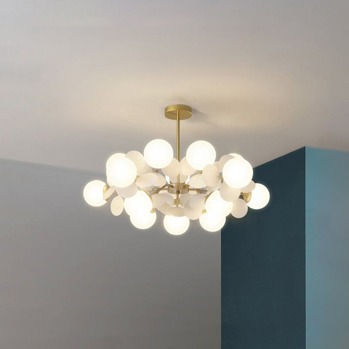Elegant flush mount ceiling light, artistic branch design and decorative flower shades.