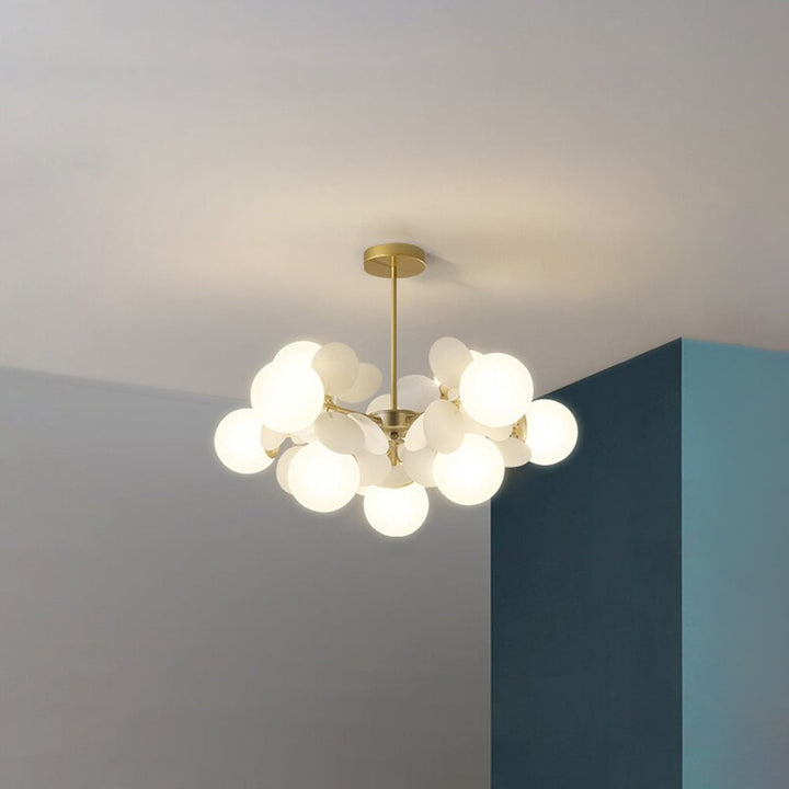 Decorative LED flush mount light, elegant metal branch design for stylish interiors.