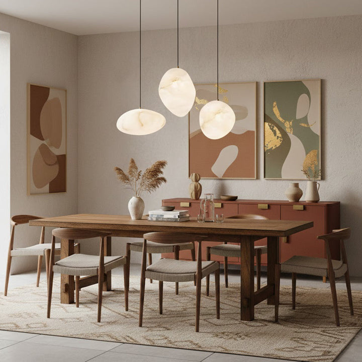 Polished brass pebble pendant, elegant and modern, an exquisite contemporary ceiling light.