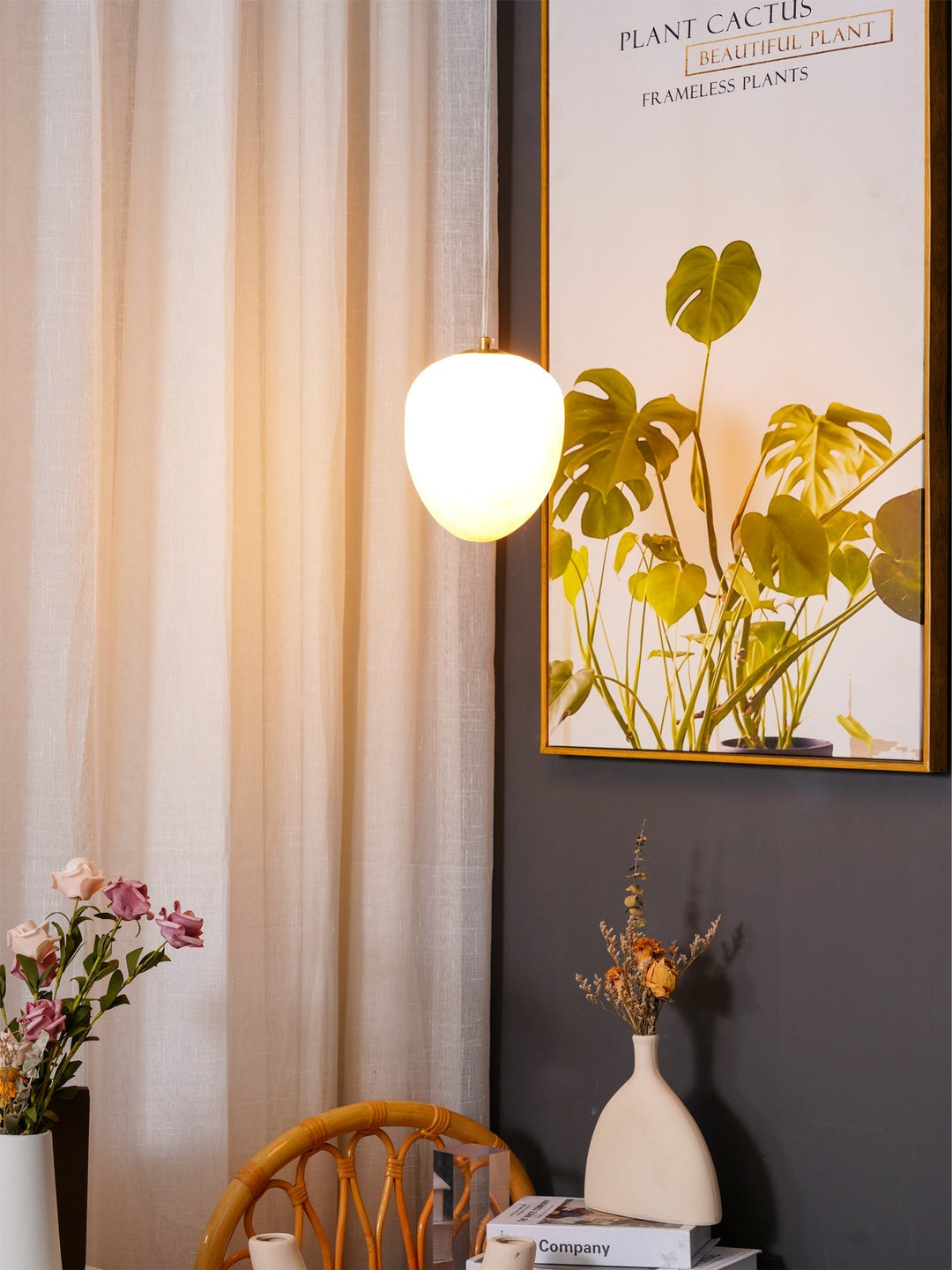 Modern ceiling light, brass pebble design, adds sophistication to contemporary decor.