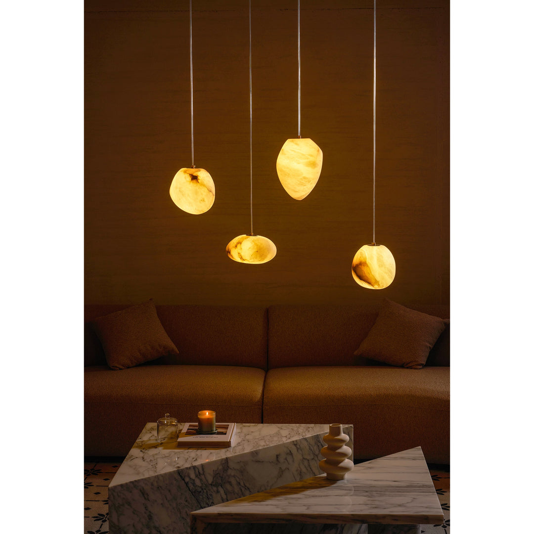 Elegant pebble pendant light, brass finish, a modern ceiling fixture for minimalist homes.
