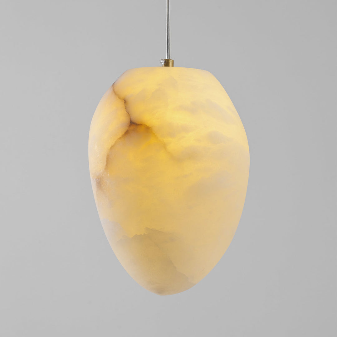 Contemporary brass pebble ceiling lamp, elegant design, perfect for modern home decor.