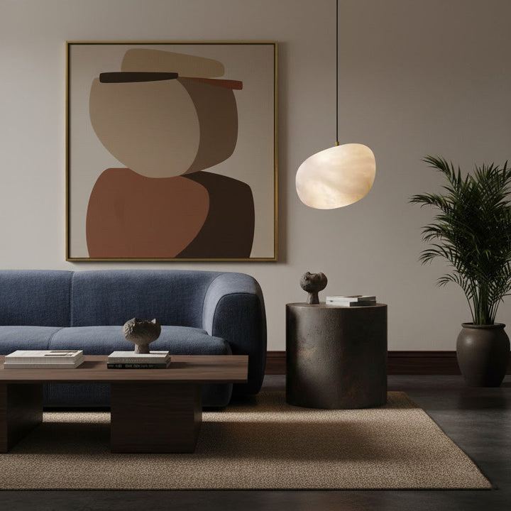 Serene interior brass pebble ceiling light, modern minimalist design, high quality lighting.