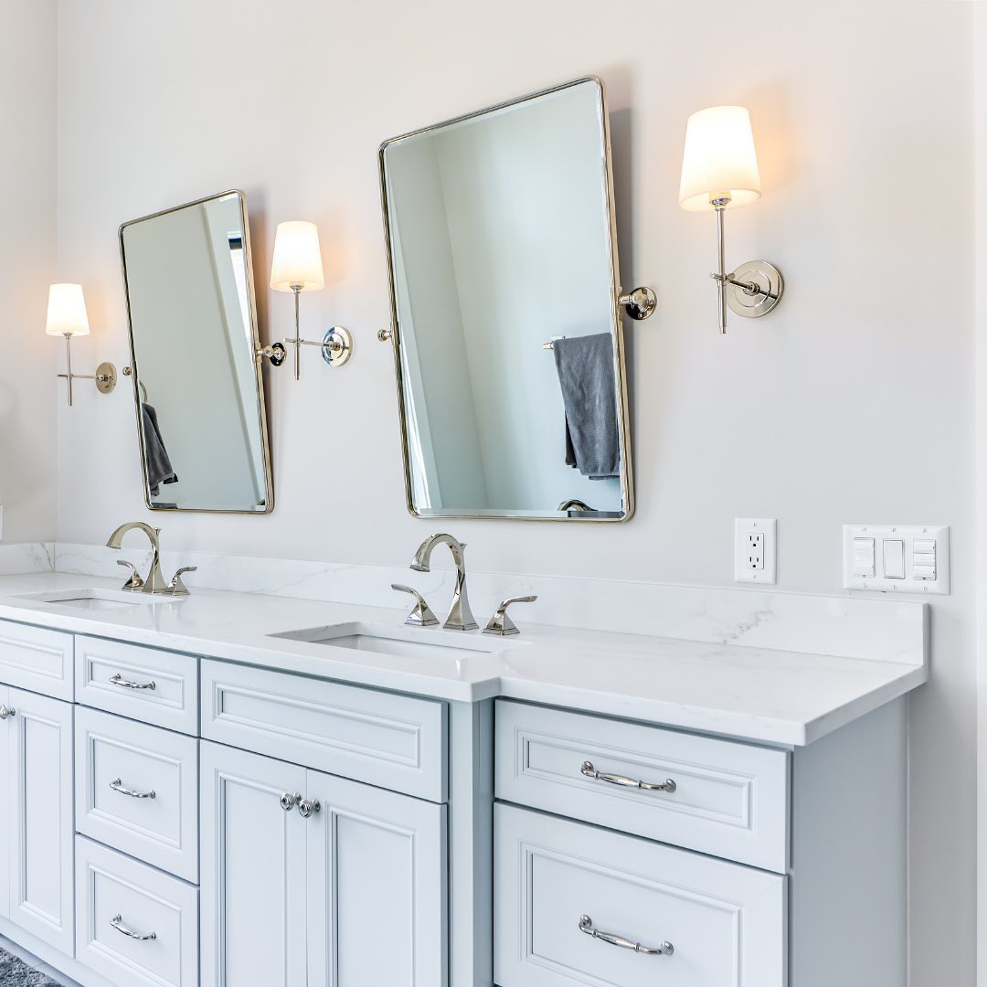 Chic Brass indoor sconce with linen shade, perfect for elegant dining.