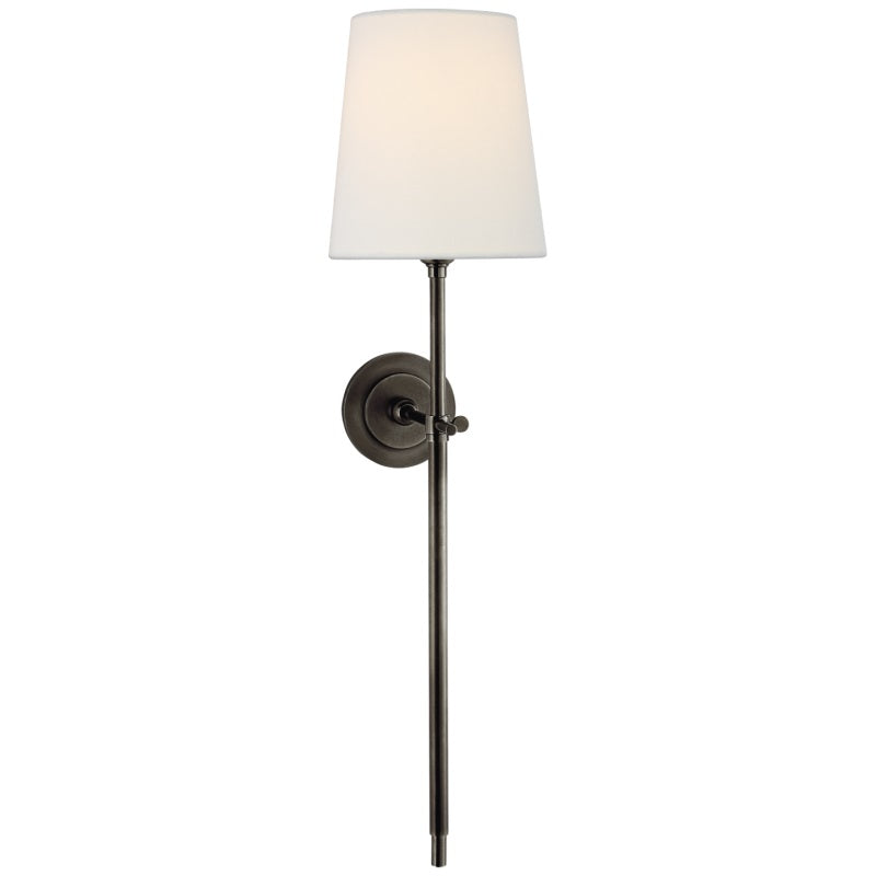 Chic Black indoor sconce with linen shade, perfect for elegant dining.