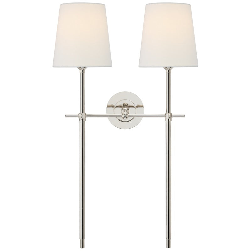 Modern Black wall sconce with fabric shade for ambient dining room light.