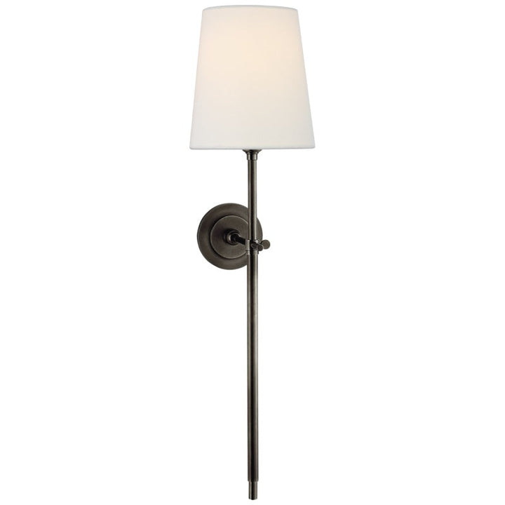 Stylish Nickel wall light fixture with drum shade for elegant hallway illumination.