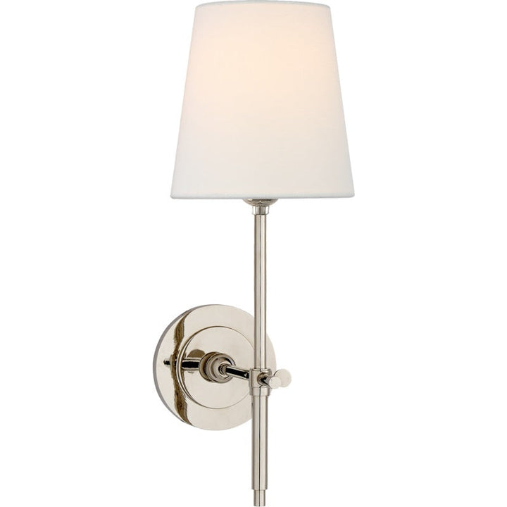 Chic Nickel indoor sconce with linen shade, perfect for elegant dining.
