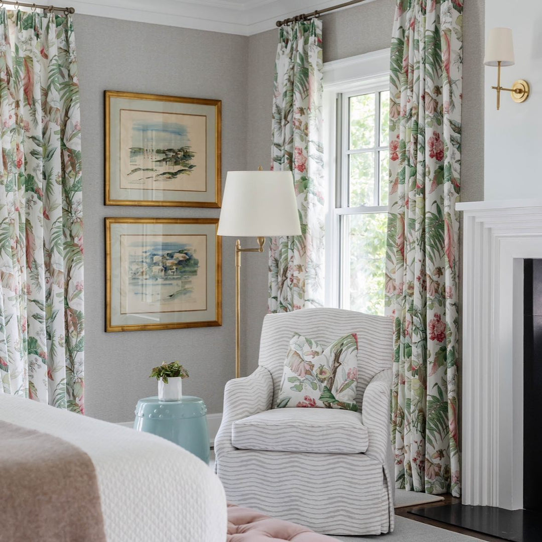 Contemporary Brass wall lamp with soft fabric shade for cozy bedroom lighting.