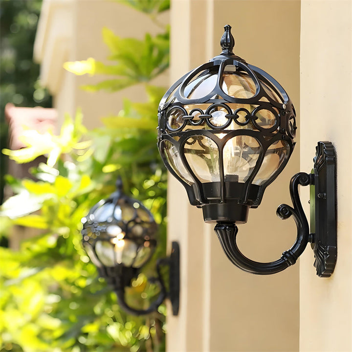 Black rustproof exterior wall light. Durable outdoor lamp for patio & garden illumination and safety.