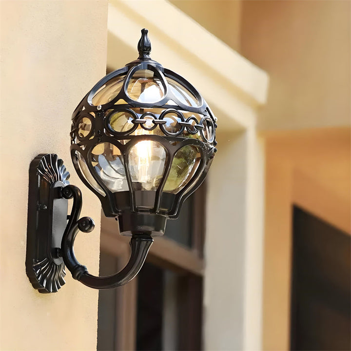 Waterproof outdoor wall sconce in bronze. Elegant vintage design for porch & exterior home lighting.