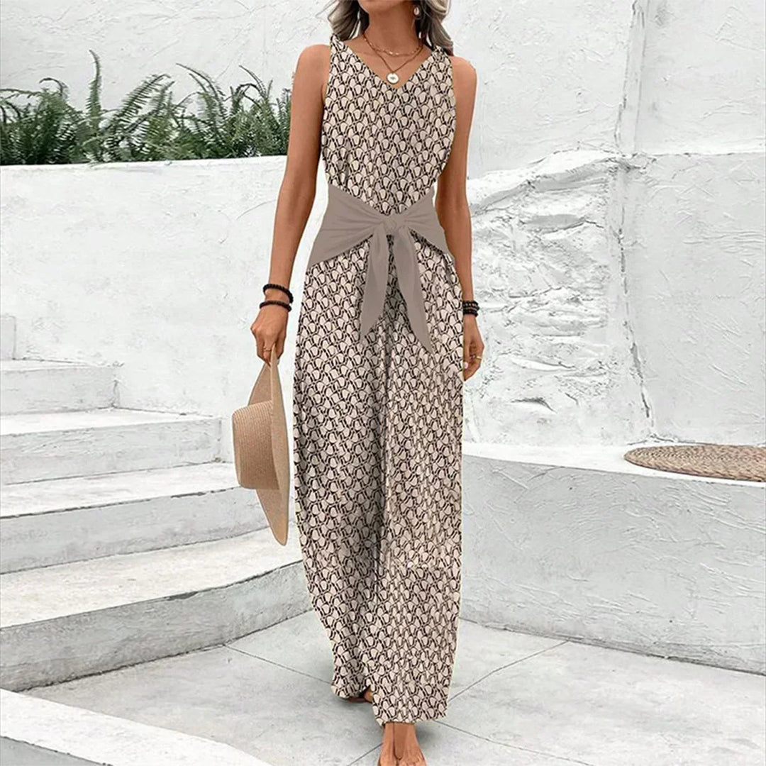 Elegant brown women's sleeveless tie-waist jumpsuit for effortless summer style. Comfortable & versatile one-piece fashion.